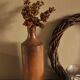 Vintage stoneware liqueur bottle with spout