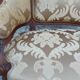 Fauteuil bergère louis XV en Noyer sculpté