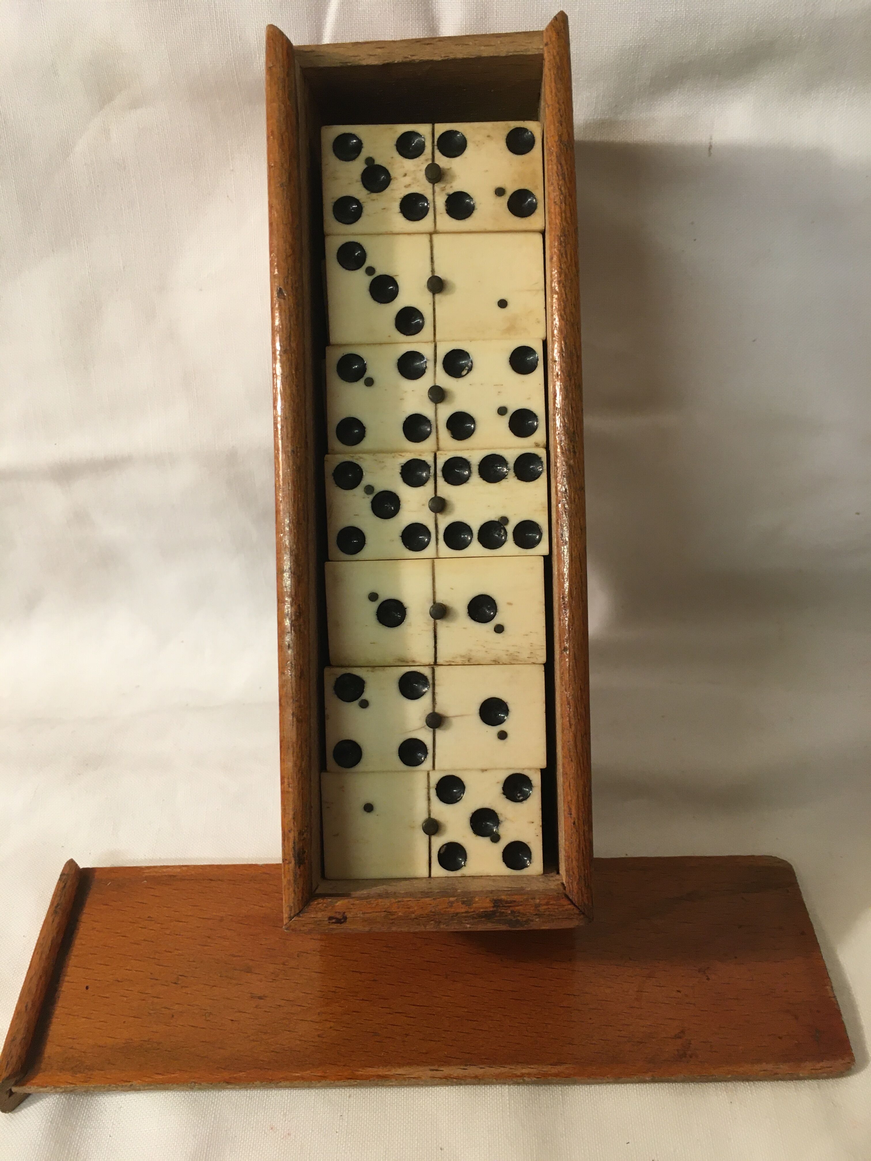 Set of ancient dominoes in wood and bone