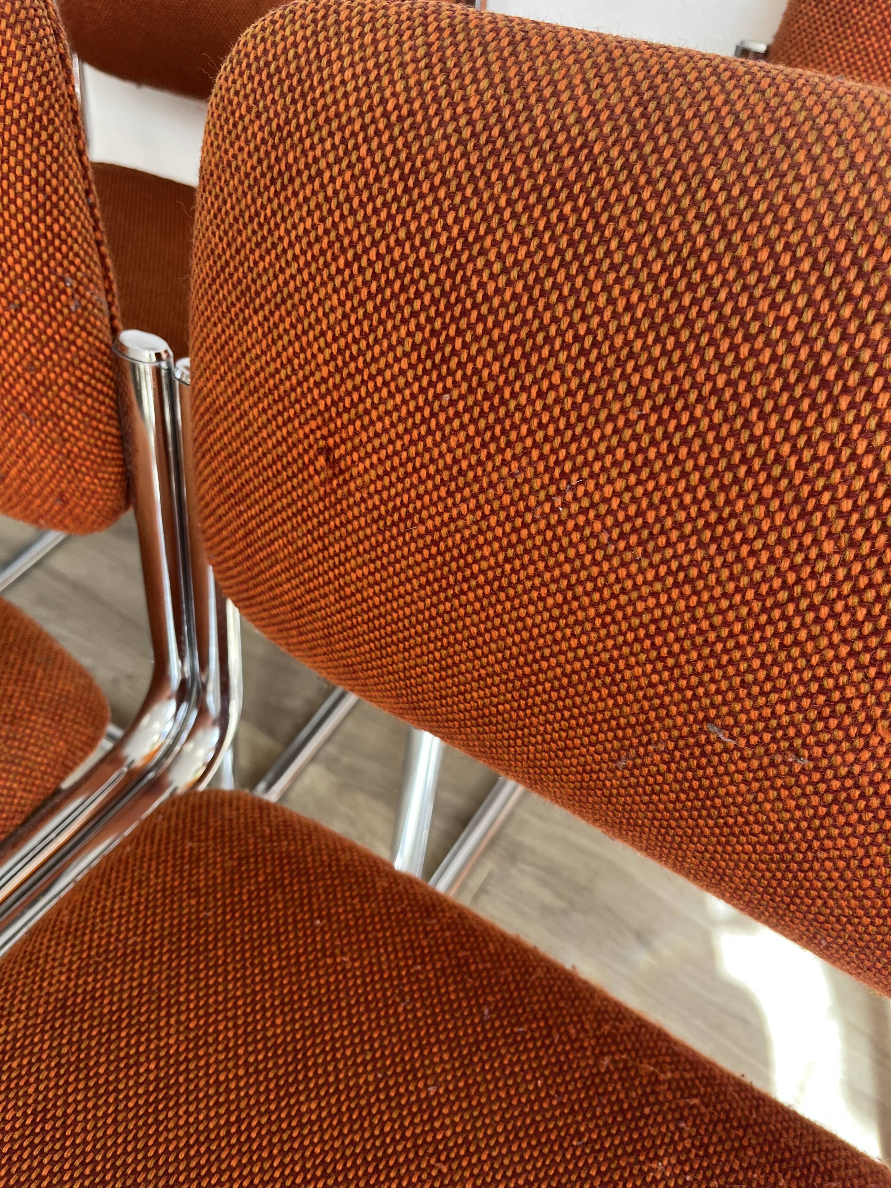 Vintage 70s orange tubular chairs
