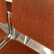 Vintage 70s orange tubular chairs