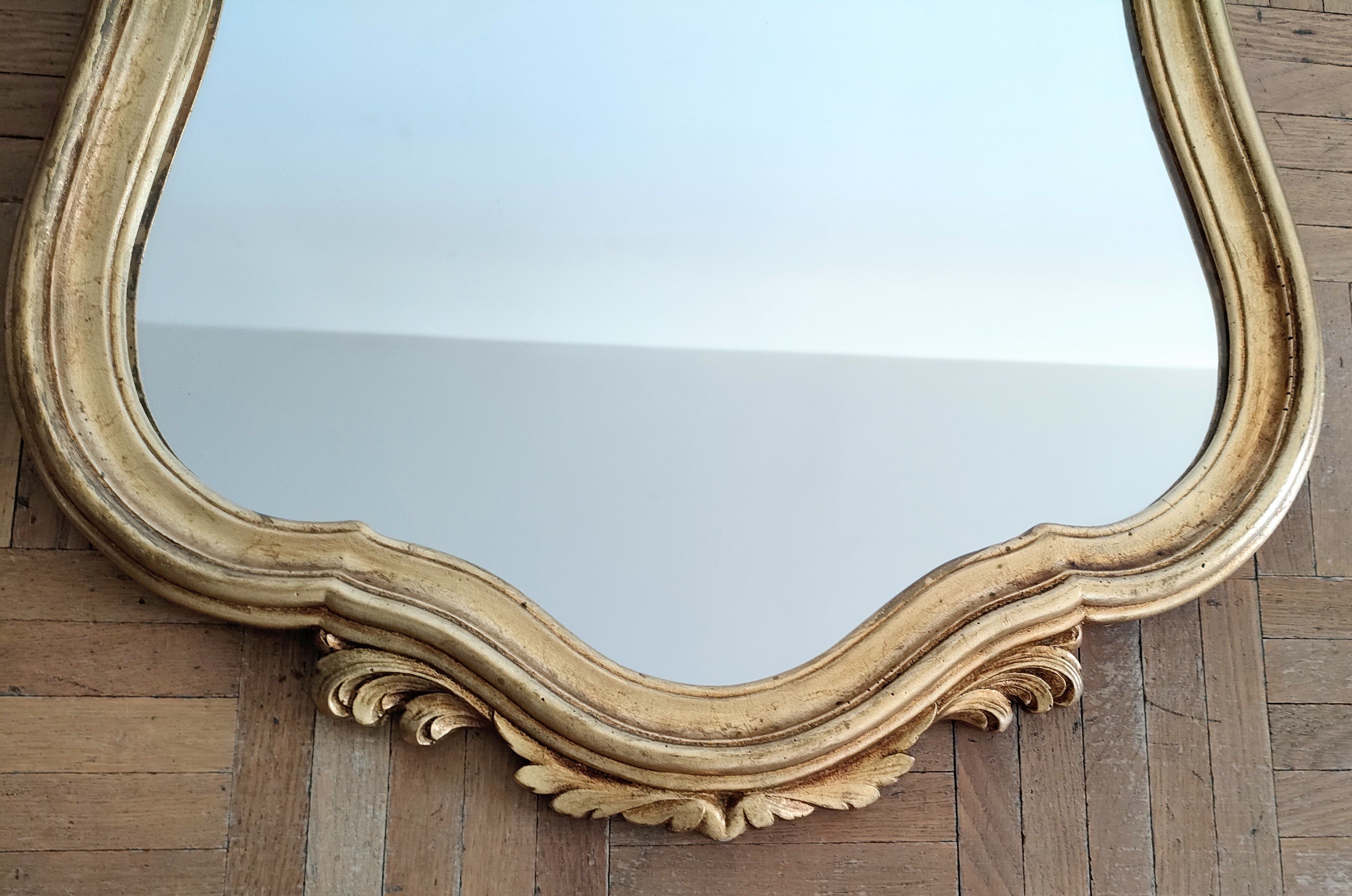 Large gilded mirror shell Louis XV style