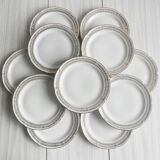 12 Limoges porcelain dessert plates, gold decoration.