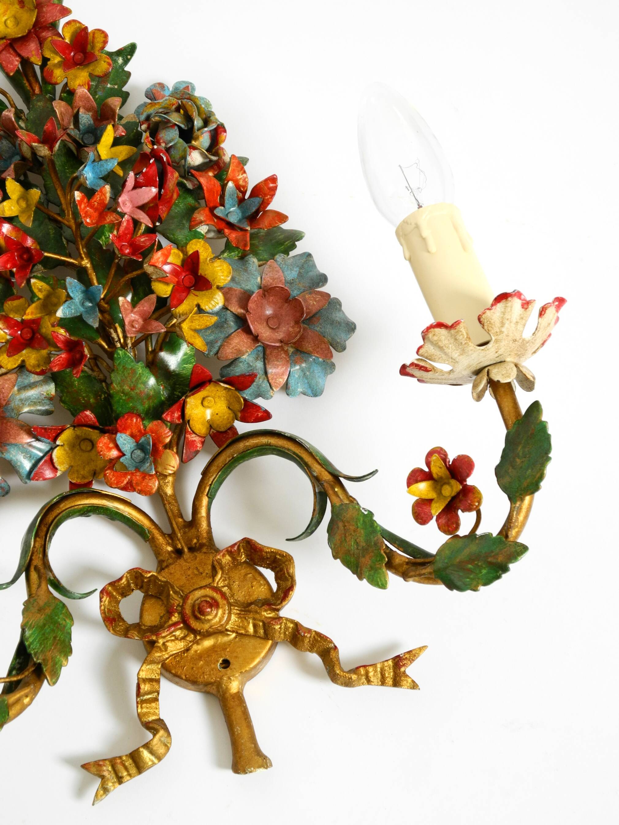 A pair of beautiful 1960s hand-painted and gilded metal wall lamps by Hans