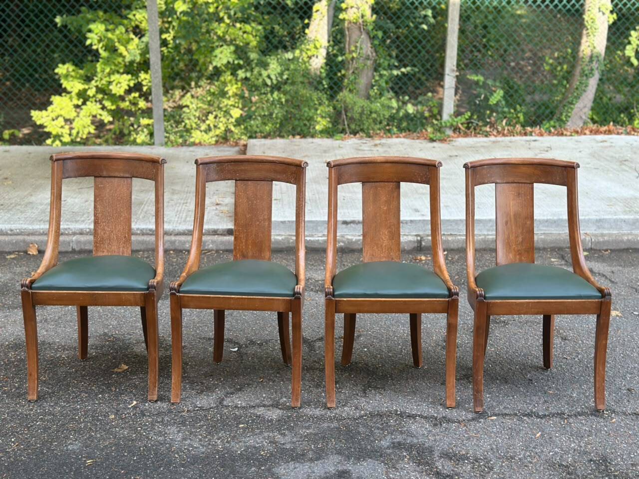 4 gondola chairs, Charles X restoration, solid wood and green leather, 19th century.