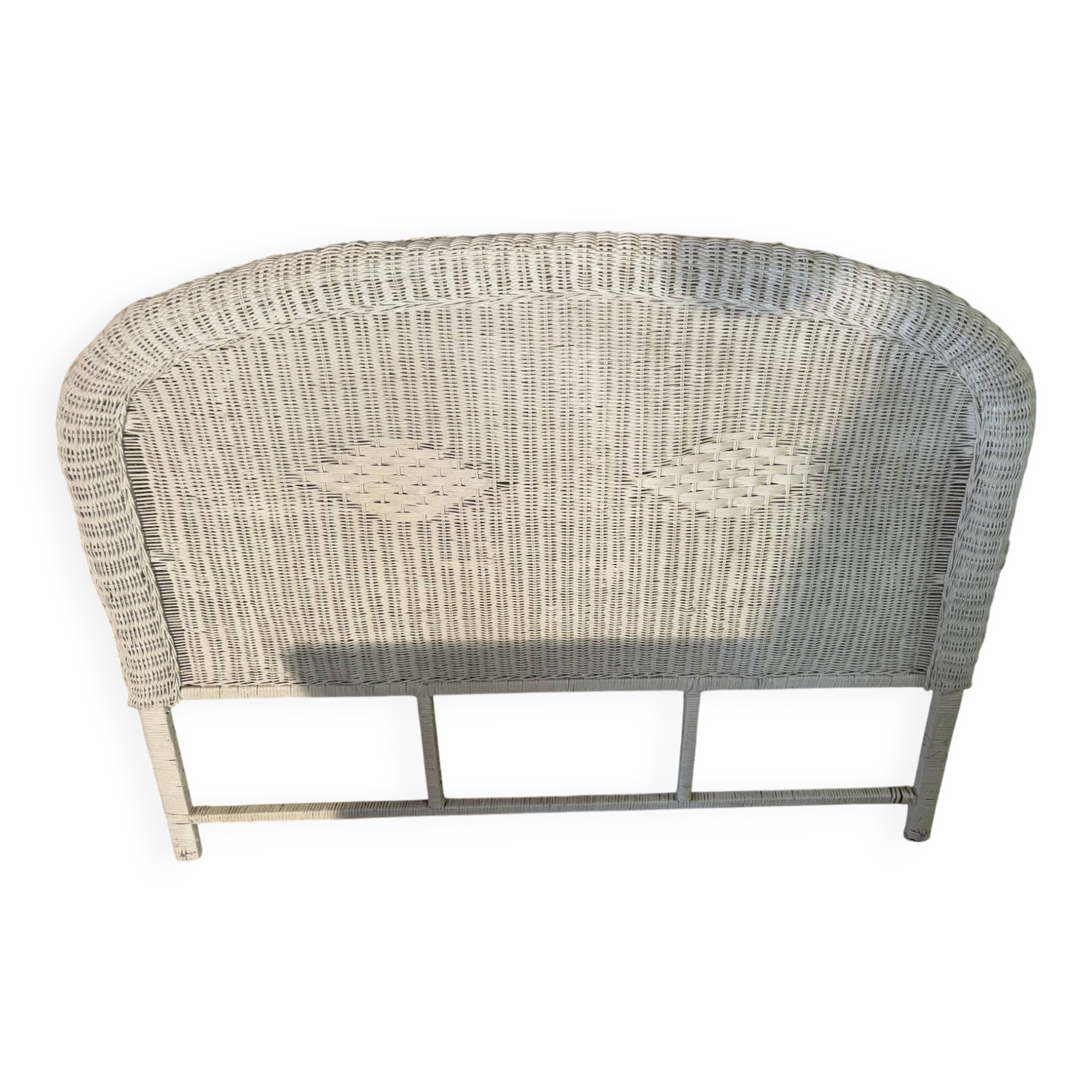 Vintage headboard in woven white rattan