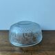 Art Deco bowl, 1930, in pressed molded glass, decorated with a woman and fruit