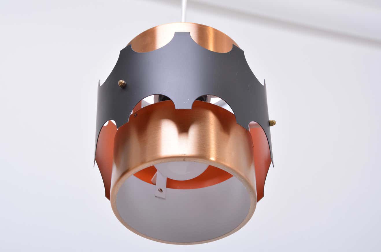 Set of two mid-century copper-colored German pendant lamps
