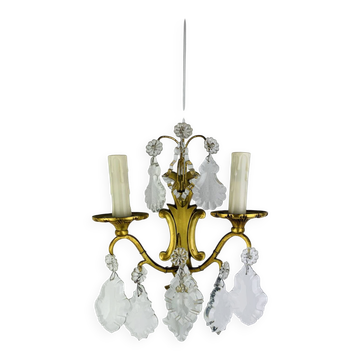 Bronze wall light with rococo style Louis XV pendants.