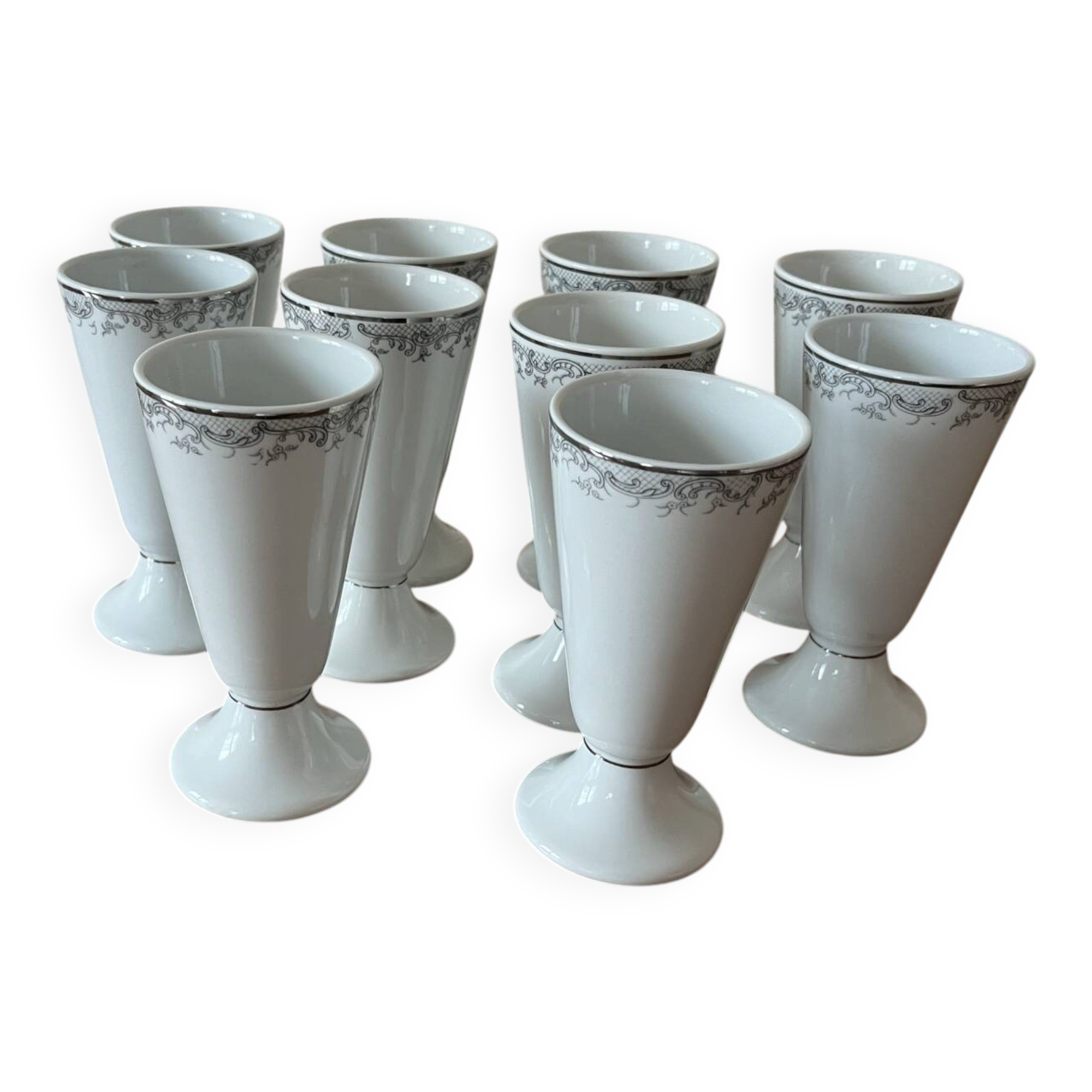 Lot of 10 Limoges porcelain mazagrans.