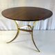 Tripod round coffee table in gilded brass and rosewood – 60s/70s