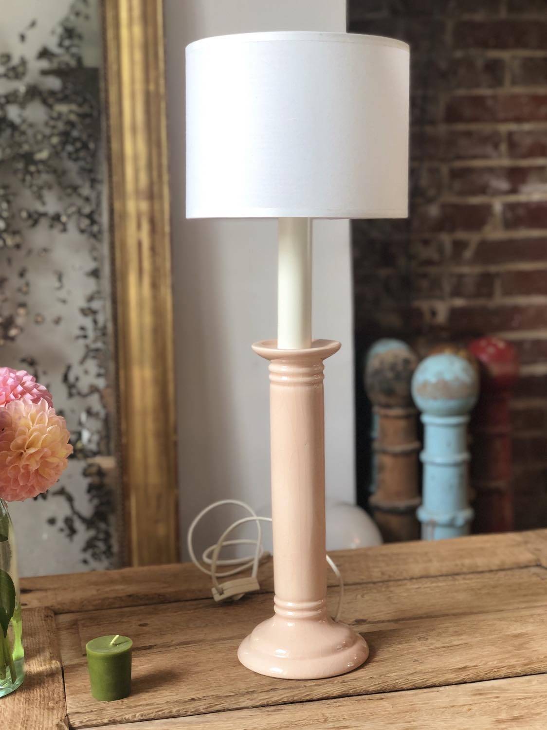 Pair of vintage salmon pink candlestick shaped ceramic lamp bases