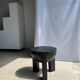 Black mango wood tripod side table with a semi-spherical top, height: 45 cm, diameter: 44 cm.