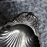 Large vintage shell-shaped platter in shiny silver-plated metal.