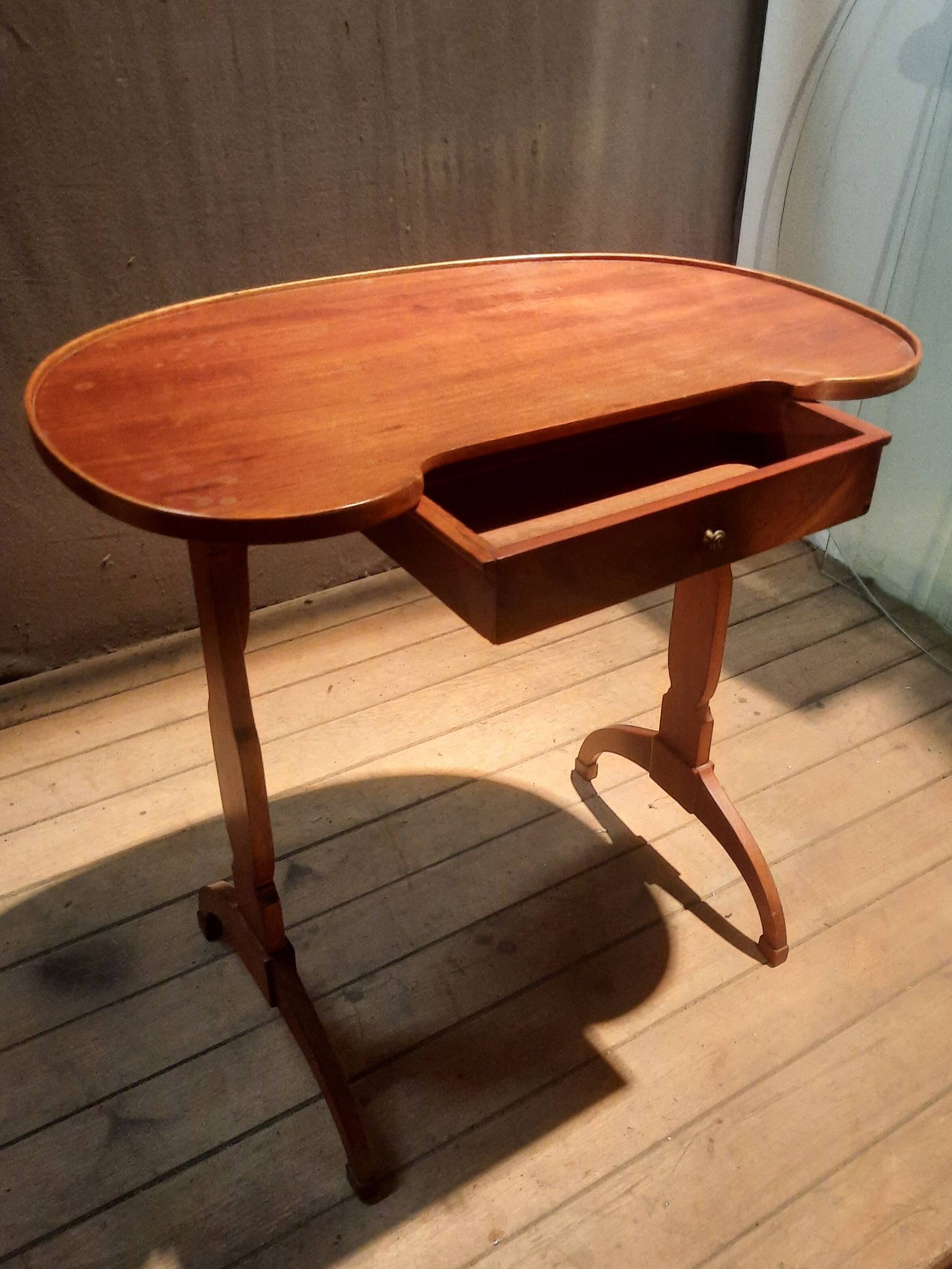 Kidney-shaped side table