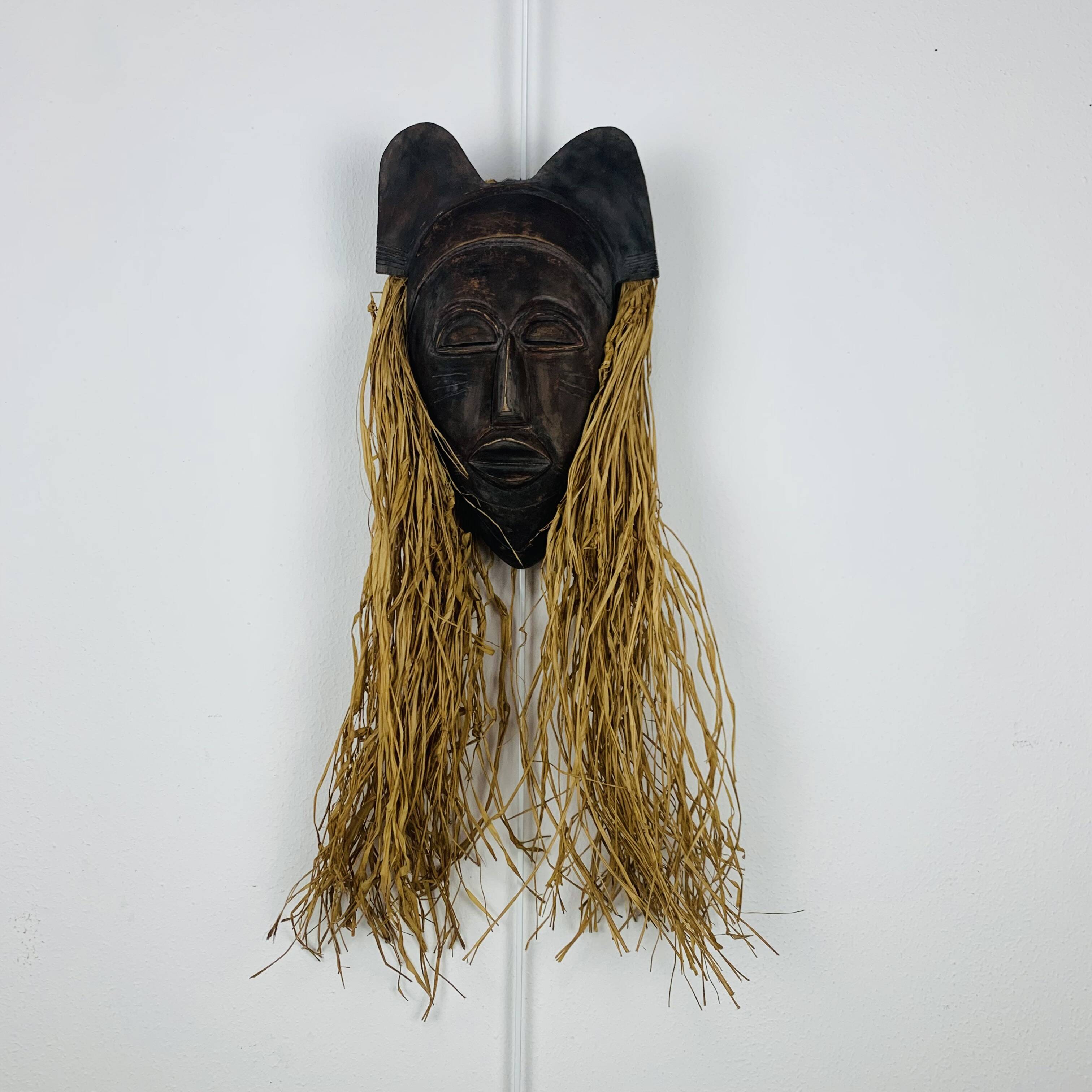 African ceramic and raffia mask signed BJ