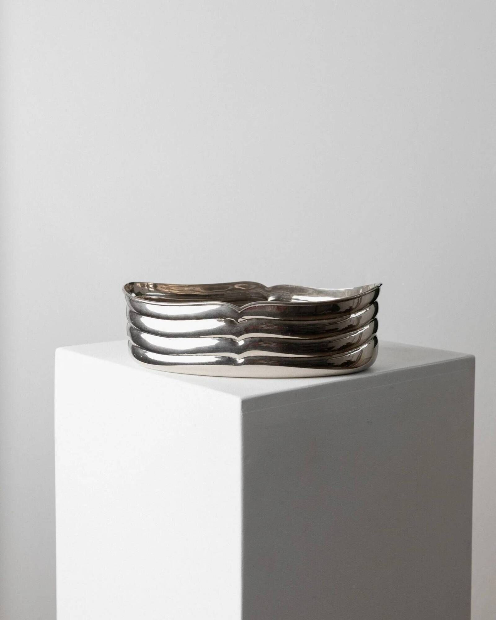 Vintage silver-plated metal bowl with curved relief design, Italy 1960s, elegant appetizer plate