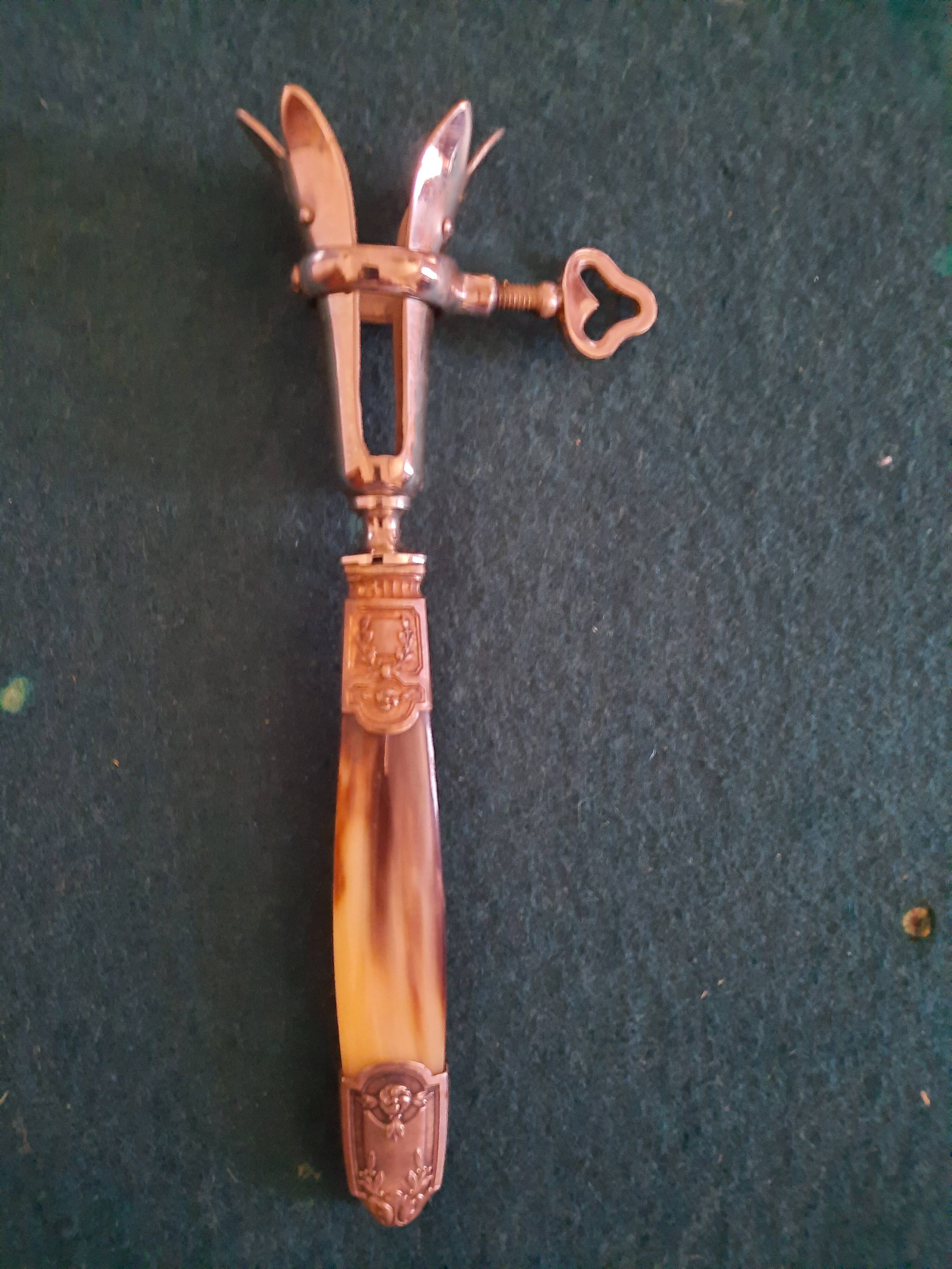 Bone and silver-plated metal cutlery set