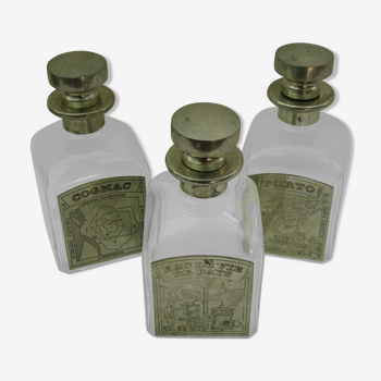 Set of tin and glass alcohol bottle