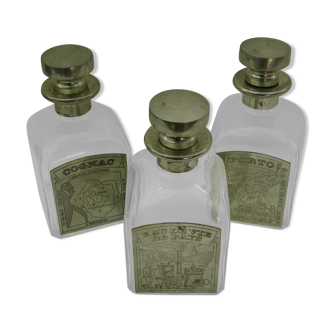 Set of tin and glass alcohol bottle