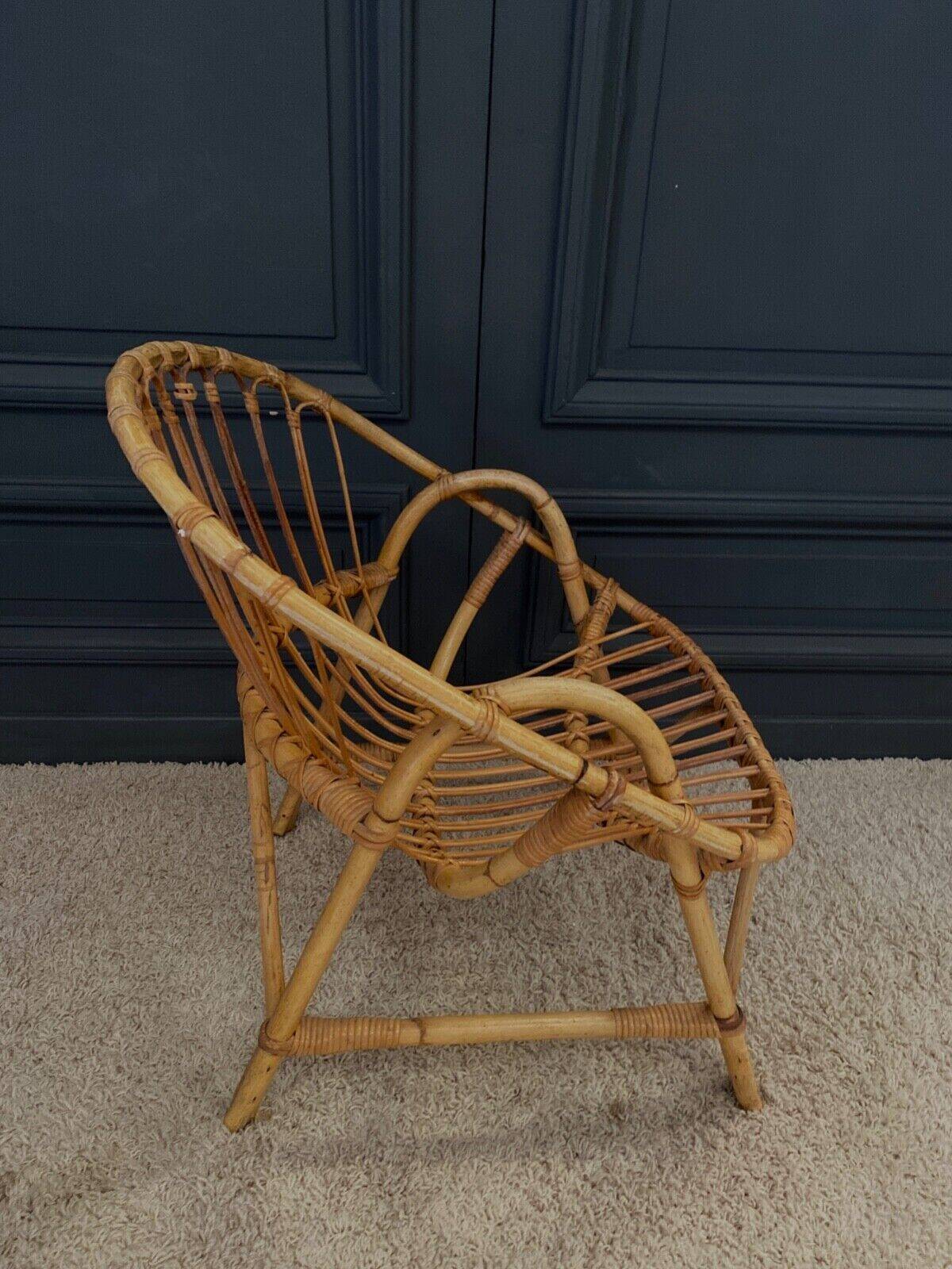 Paire de fauteuils en rotin, travail français 1960