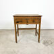 Vintage industrial wooden side table with drawers on casters