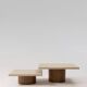 Noā nesting tables in waxed concrete with walnut legs