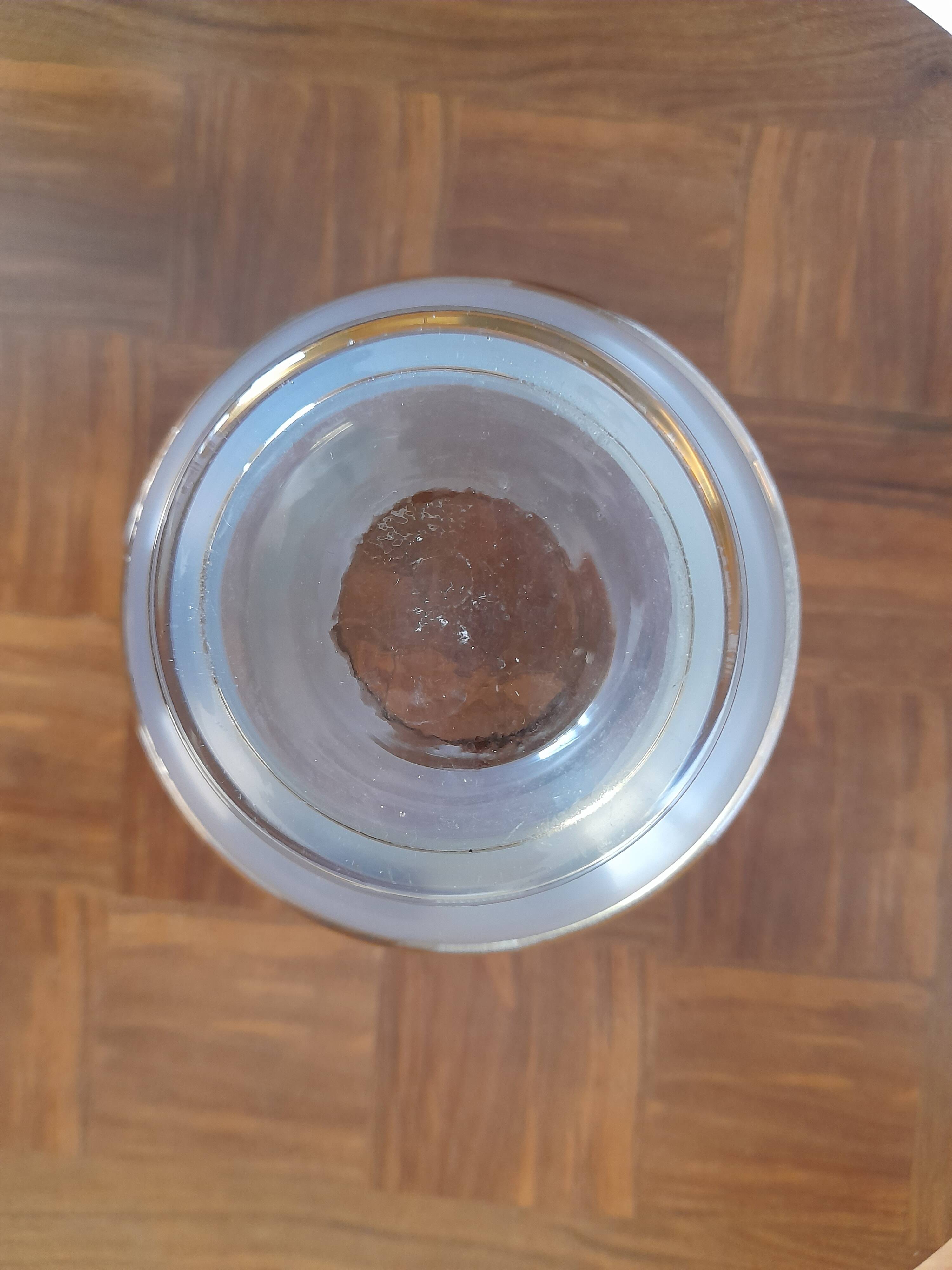 Old glass vase with gilding and Art Deco painted flowers