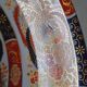 Large deep porcelain plate in Imari style (35.5 cm) with "Phe" decoration.
