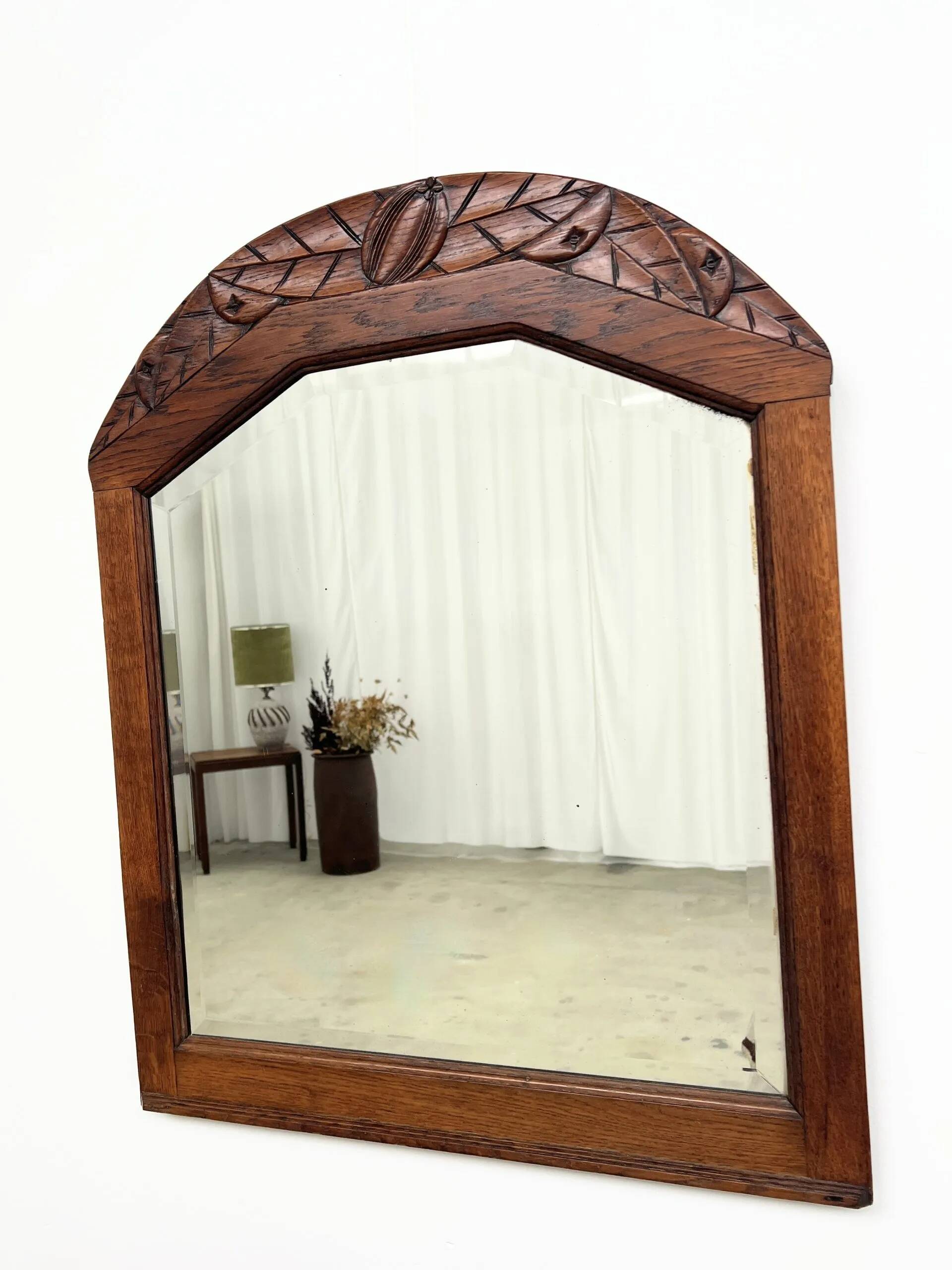 Art Deco oak mirror with carved motif