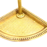 Old brass umbrella door triangular base mounted on column