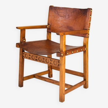 19th century oak and cognac leather brutalist castellana spanish armchair