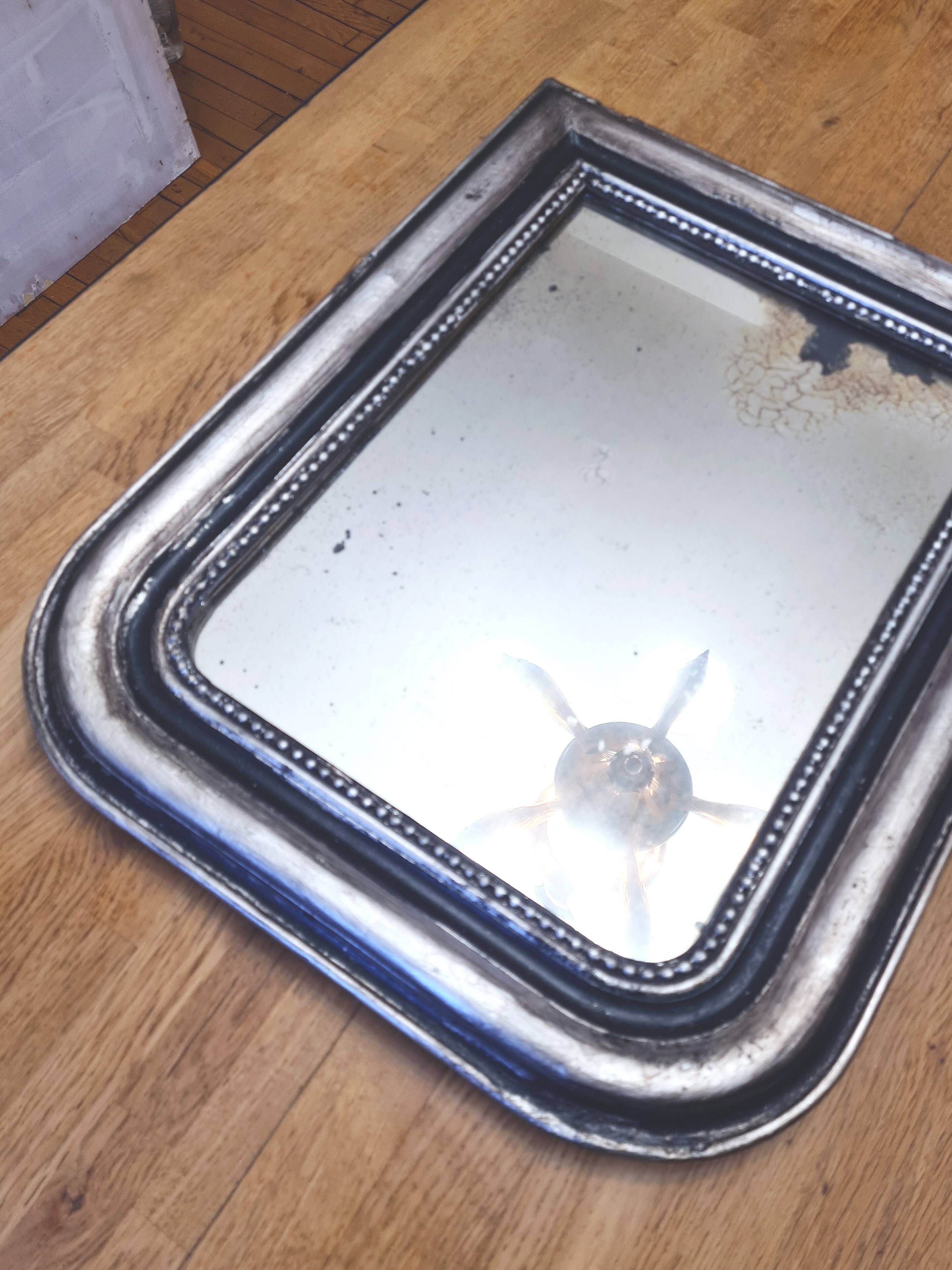 Old Louis Phillipe mirror, silvered with silver leaf.