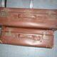 Pair of red suitcases from the 1950s