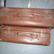 Pair of red suitcases from the 1950s