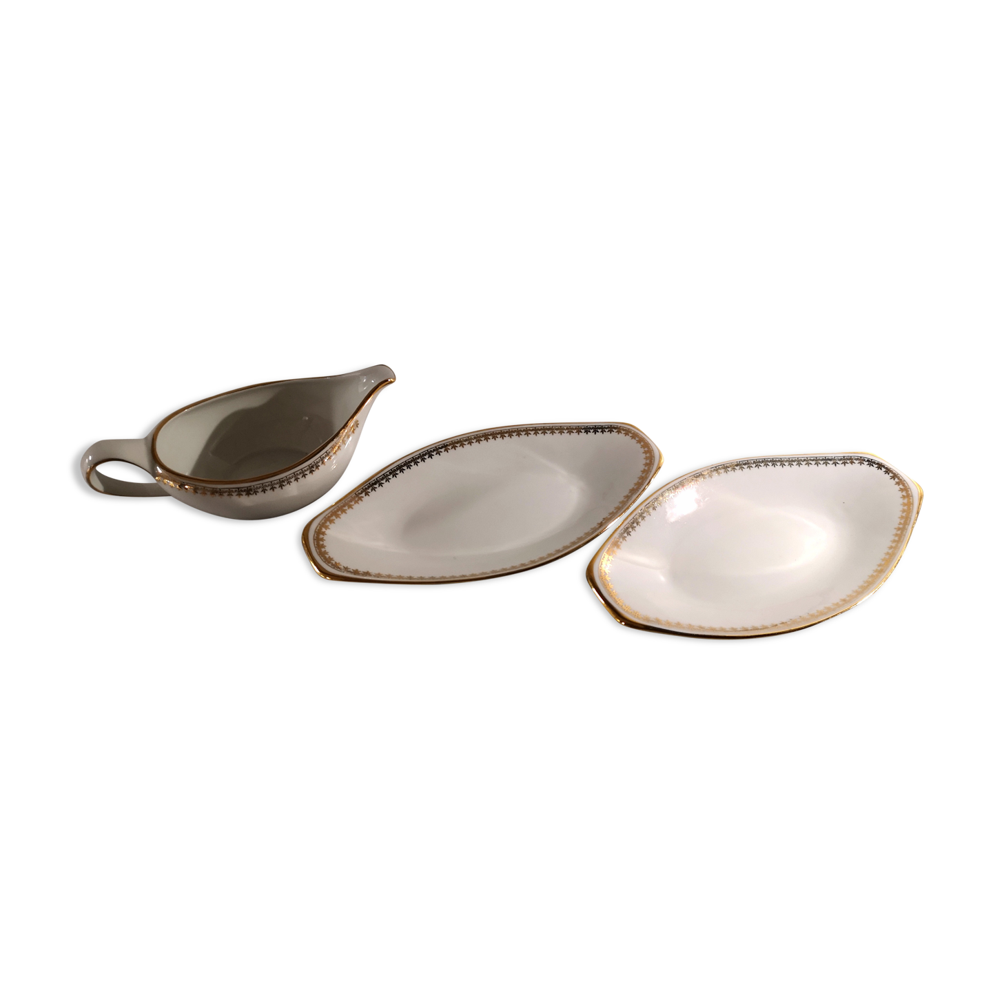 Gravy boat and dishes with gold decoration