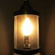 Lantern brass wall lamp