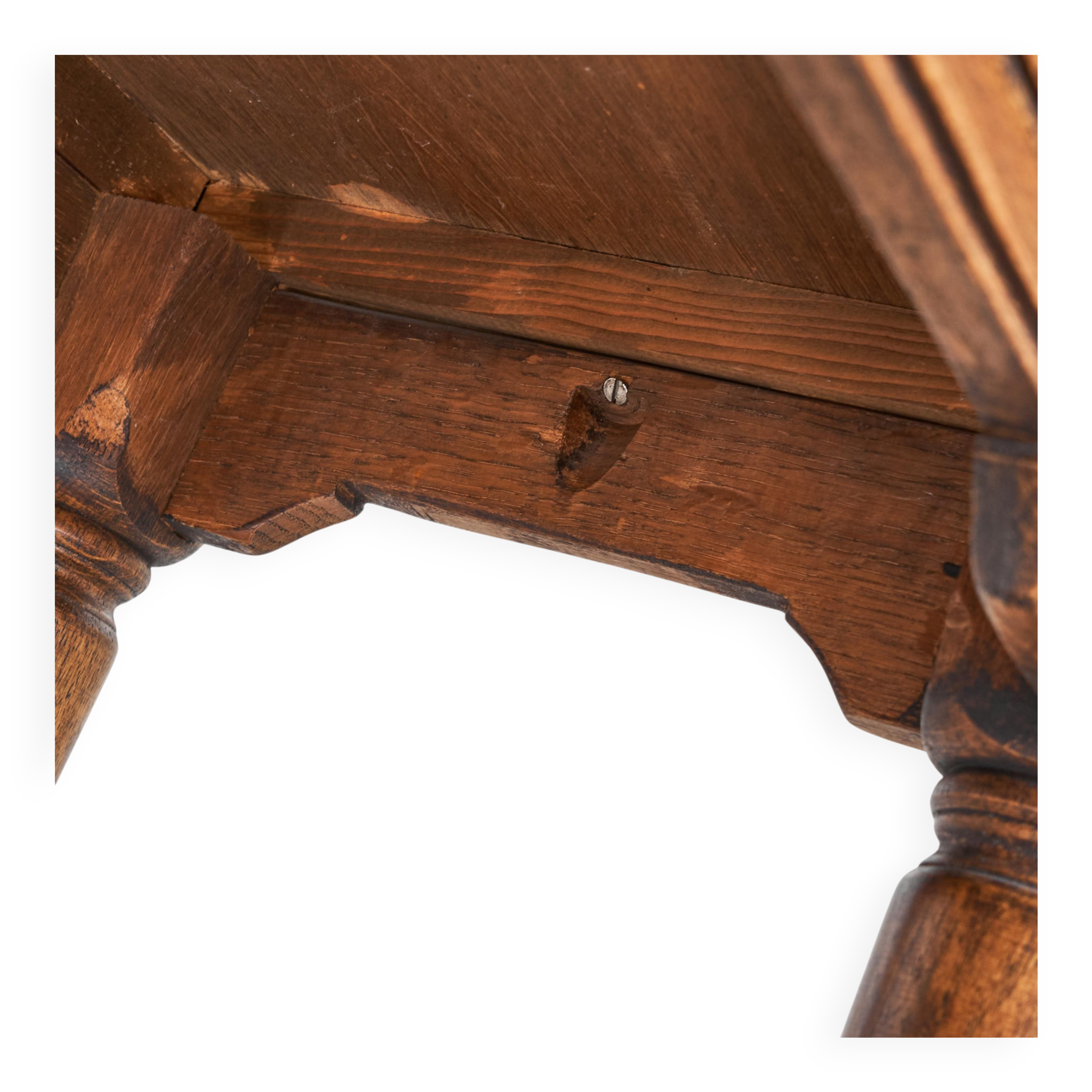 Brutalist coffee table in solid oak, metal, and patinated leather, 1940s.
