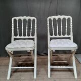 Pair of upholstered folding chairs