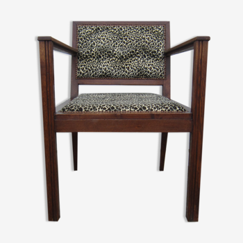 Old leopard fabrics armchair