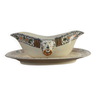 Old earthenware gravy boat