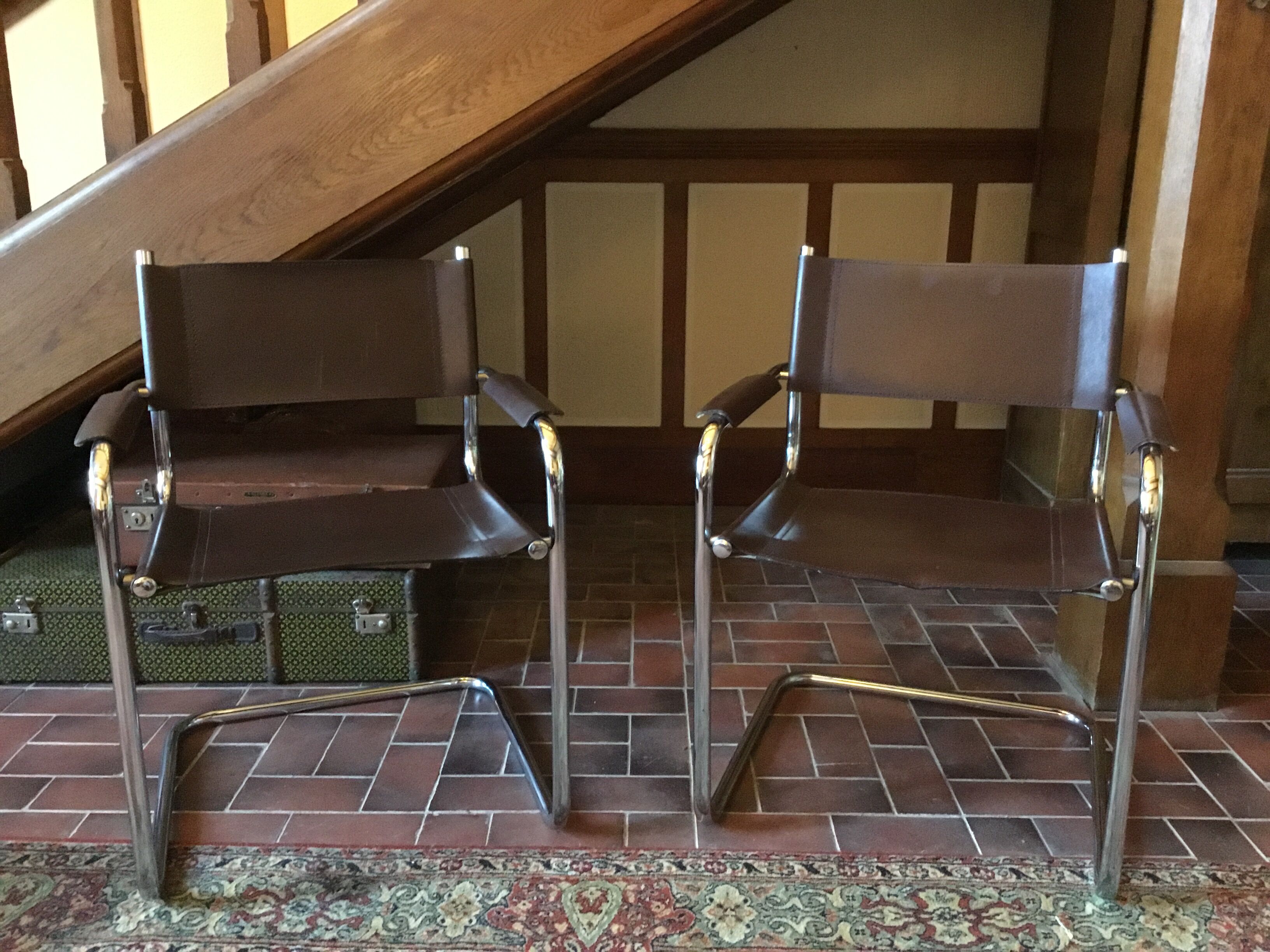 Leather and steel armchairs