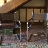 Leather and steel armchairs