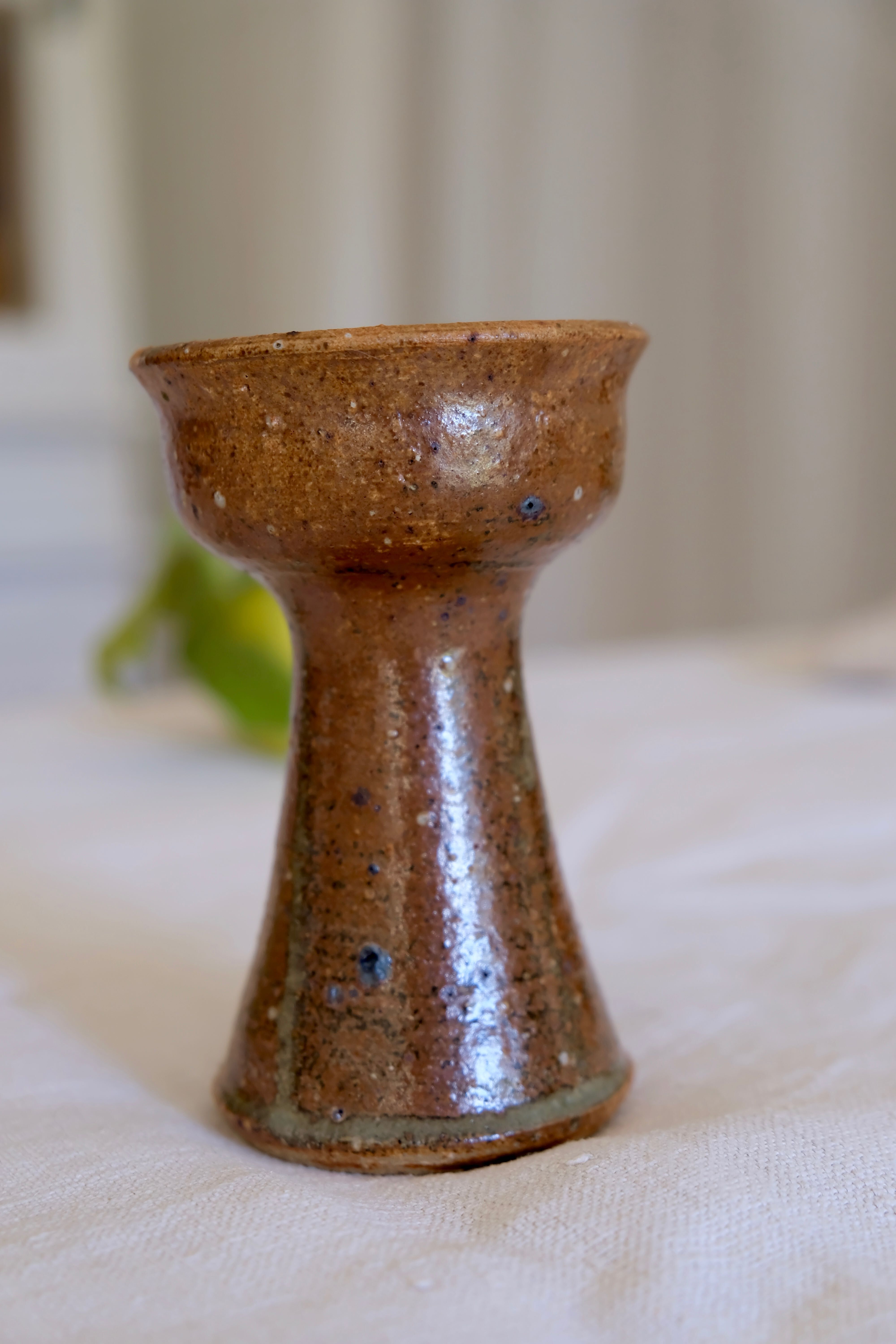 Old sandstone candle holder