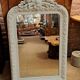 Louis Philippe mirror with patinated cartouche