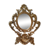Miroir ovale baroque pivotant sur pied laiton doré 20x15cm
