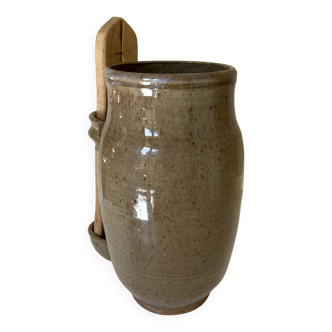 Old varnished stoneware pickle pot with tongs