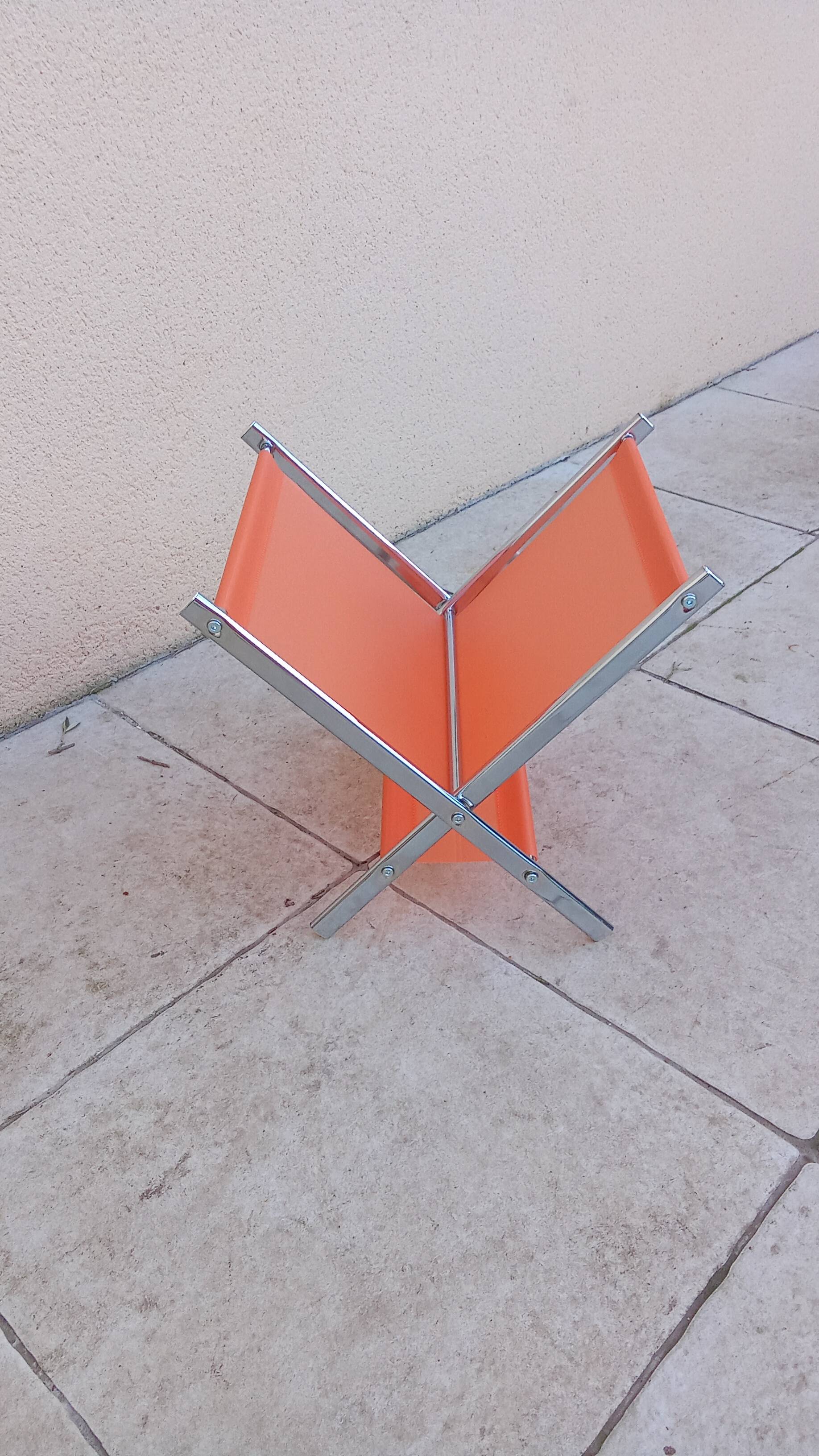 Vintage chrome and orange magazine rack from the 70s and 80s