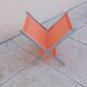 Vintage chrome and orange magazine rack from the 70s and 80s