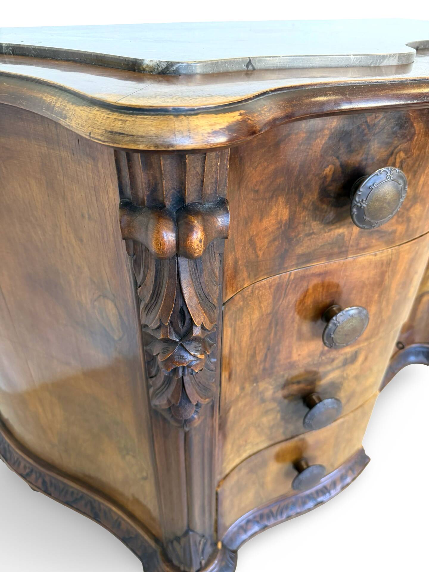 serpentine commode in antique walnut